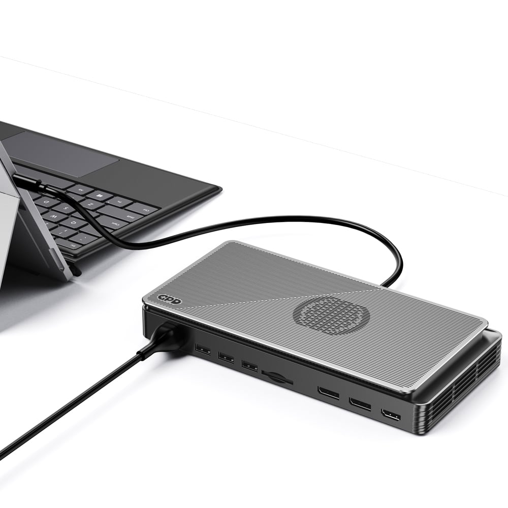 Image of a GPD G1 handheld device connected to a laptop.