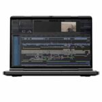 A black GPD DUO laptop displaying a complex video editing interface on its screen. The interface shows multiple timelines with various colored segments, a video preview window in the top right corner, and editing tools on the left side. The laptop has a sleek design with a visible webcam at the top of the screen and appears to be a high-performance device suitable for professional video editing tasks.