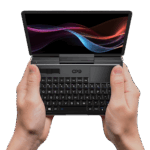 The GPD MicroPC 2 being held in both hands, showcasing its compact 7-inch touchscreen, rugged industrial design, and thumb-typing-friendly keyboard for IT professionals and field engineers