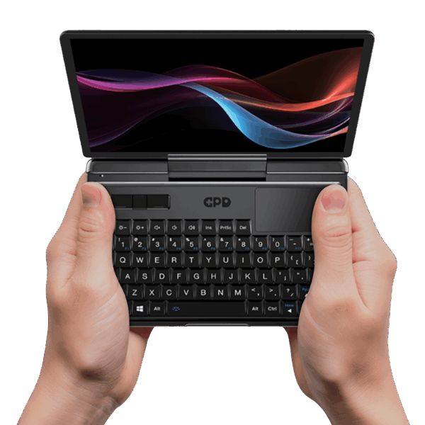 The GPD MicroPC 2 being held in both hands, showcasing its compact 7-inch touchscreen, rugged industrial design, and thumb-typing-friendly keyboard for IT professionals and field engineers