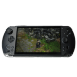 A GPD WIN 5 handheld gaming console in a dark grey color is centered against a plain grey background. The console's large widescreen display shows a third-person video game with a character standing on a stone path next to a wall. The console features a D-pad and analog stick on the left, and face buttons (A, B, X, Y) and a second analog stick on the right. Additional buttons like a menu button and start/select buttons are also visible.
