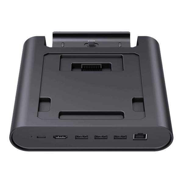 A three-quarter frontal view of a black GPD WIN 5 docking station, isolated against a black background. The dock features an array of ports on the front edge, including USB-C, USB-A, and an RJ45 Ethernet port. The recessed top area is designed to hold the GPD WIN 5 and includes a connector for charging and data.