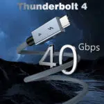 En stiliserad marknadsföringsbild med texten "Thunderbolt 4" högst upp. En stor 3D-metallisk "40 Gbps"-logotyp är sammanflätad med den flätade kabeln mot en mörk bakgrund av bergslandskap.