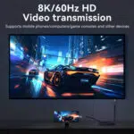 Focus: 8K Video Transmission Visual: Näyttää älypuhelimen yhdistettynä suureen televisioruutuun, jossa näkyy kilpa-auto. Avaintieto: Korostaa 8K/60Hz-tarkkuutta ja yhteensopivuutta konsolien ja mobiililaitteiden kanssa.