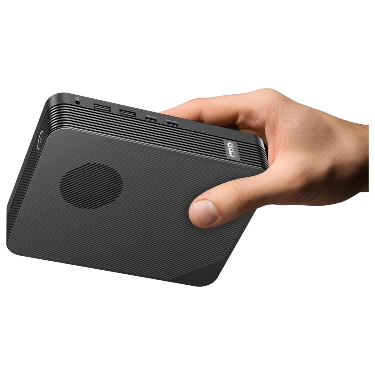 GPD-BOX-MARKETING-DONE-021 - GPD | PC Gaming Handhelds & Mini Laptops A person's hand holds the matte black GPD unit horizontally against a white background, highlighting its small, handheld form factor. The side profile clearly shows the headphone jack, dual USB-A ports, and dual USB4 V2.0 ports.