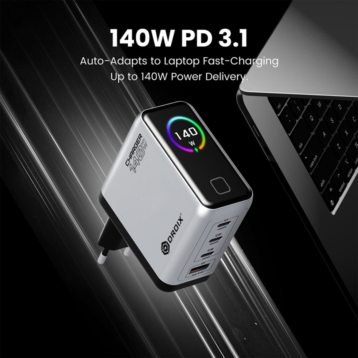 DROIX-140W-MARKETING-DONE-011 - GPD | PC Gaming Handhelds & Mini Laptops A close-up shot of the silver DROIX 140W charger showing its four ports and integrated visual display. The text emphasizes "140W PD 3.1" technology, highlighting its ability to auto-adapt and fast-charge high-performance laptops.