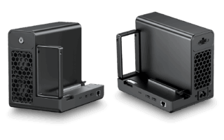GPD G2 eGPU external graphics card enclosure, shown in two perspectives against a black background, with visible ports, power supply, and internal PCIe slot for custom GPU installation.