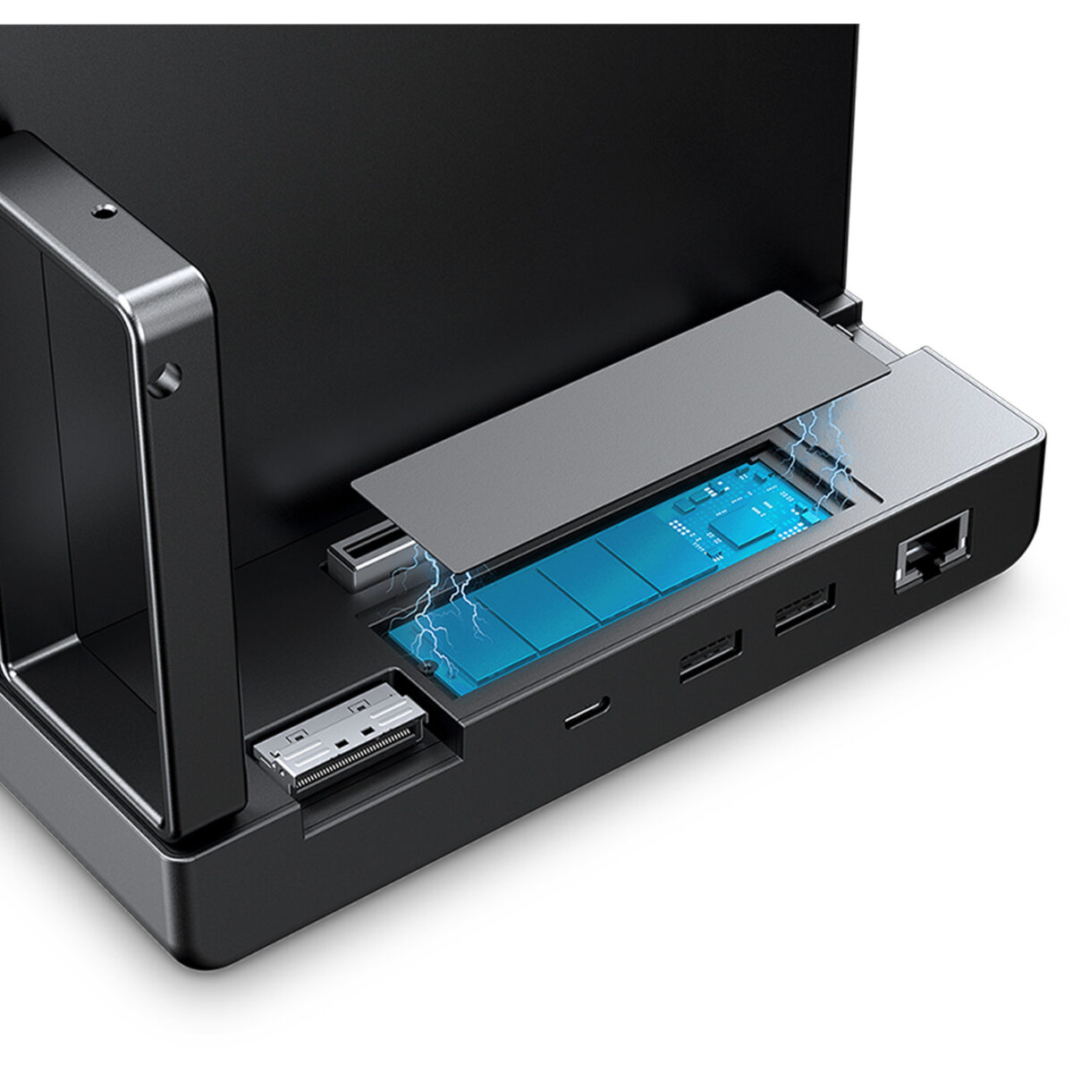 GPD-G2-MARKETING-DONE-8 - GPD | PC Gaming Handhelds & Mini Laptops Close-up of the GPD G2 docking station base showing the integrated NVMe M.2 2280 SSD slot with a magnetic cover, surrounded by USB4 v2.0, USB Type-A, and Ethernet ports.