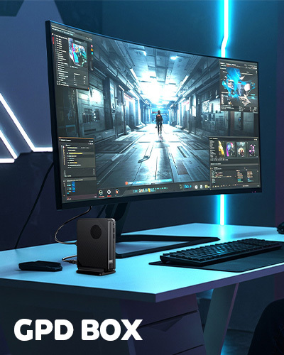 Gaming desk setup with a large curved monitor showing a sci‑fi game scene, a compact black PC tower on a blue desk, keyboard, mouse, and blue neon lighting.